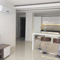 Просторные меблированные апартаменты 1+1 в районе Клеопатра, в г.Аланья