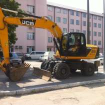 Экскаватор, в Томске